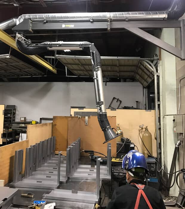 Diversitech Extraction Arm connected to Filterhawk Cartridge Dust Collector at MCM 2001 Inc. in Toronto